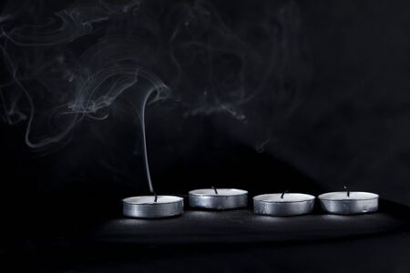 Extinguished Candles with Smokeの写真素材