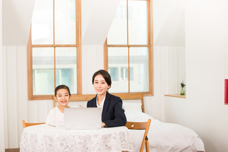 Young Student And A Female Teacherの写真素材