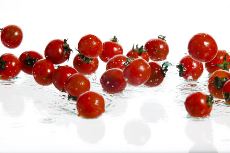 Cherry Tomatoes Splashingの写真素材