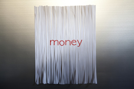 Reassembled Shredded Paper With Money Written On Itの写真素材