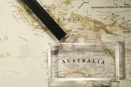 Magnifying Glass Placed On A World Mapのeditorial素材