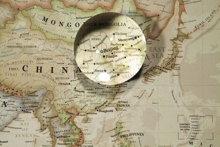 Glass Ball Placed On A World Mapのeditorial素材