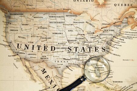 Magnifying Glass Placed On A World Mapのeditorial素材