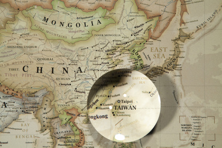 Glass Ball Placed On A World Mapのeditorial素材