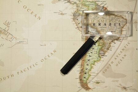 Magnifying Glass Placed On A World Mapのeditorial素材