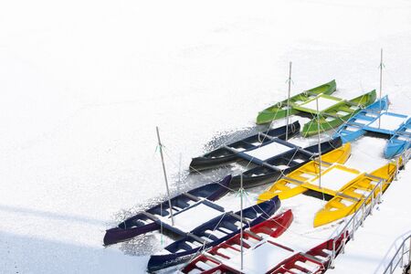 Kayak tied to a frozen river; Chuncheon, Gangwon-do, South Korea,の写真素材