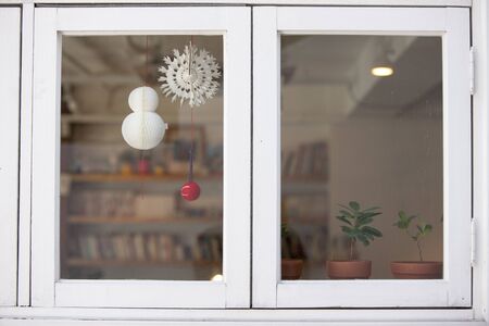 Ornaments attached to the windowの写真素材