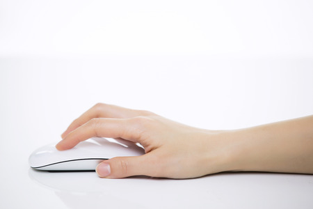 Hands using a mouse Close-Upの写真素材