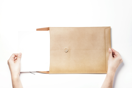 Beige leather texture envelope-isolated on whiteの写真素材