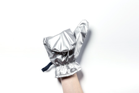 Close up shot of fireproof/oven mittens-isolated on whiteの写真素材