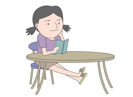 Young woman reading at her tableのイラスト素材