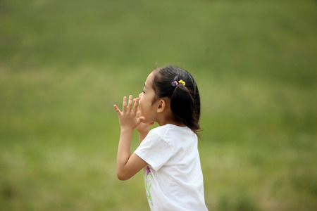 Girl playing outsideの写真素材