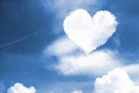 Heart shaped cloud in the skyの写真素材
