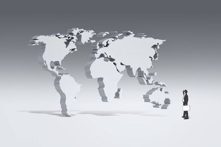 Business Man with 3D world map in the backgroundの写真素材