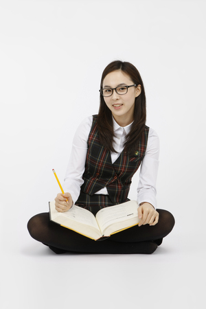 Asian students- Isolated on studio shotの写真素材