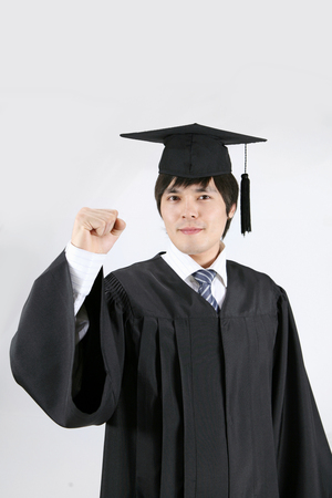 Asian students- Isolated on studio shotの写真素材