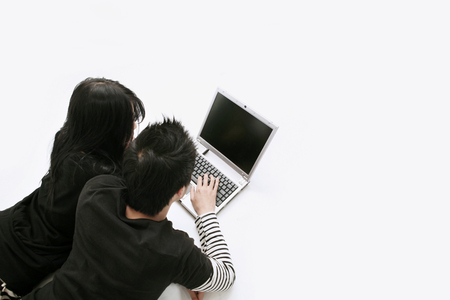 Asian students- Isolated on studio shotの写真素材