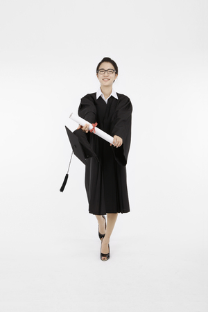 Asian students- Isolated on studio shotの写真素材