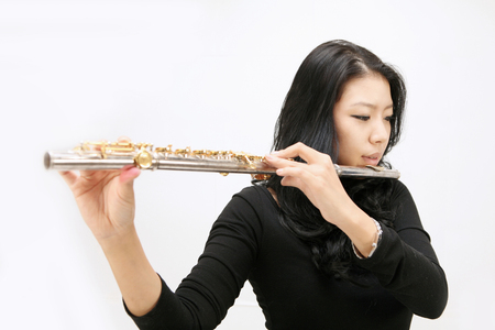 Asian students play music- Isolated on studio shotの写真素材