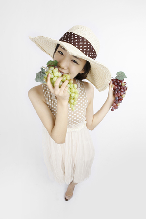 Asian students go on picnic- Isolated on studio shotの写真素材