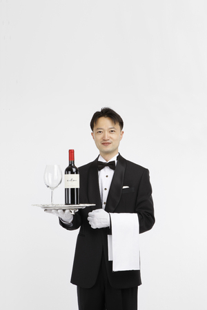 Asian students with cooking concept- Isolated on studio shotの写真素材