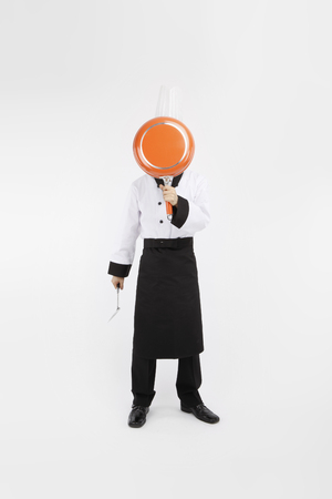 Asian students with cooking concept- Isolated on studio shotの写真素材