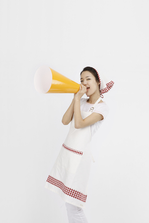 Asian students with cooking concept- Isolated on studio shotの写真素材