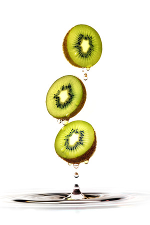 Kiwi fruits with water dropsの写真素材
