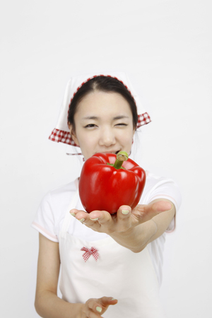 Asian students with cooking concept- Isolated on studio shotの写真素材