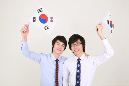 Asian business people in the studio - isolated on whiteの写真素材