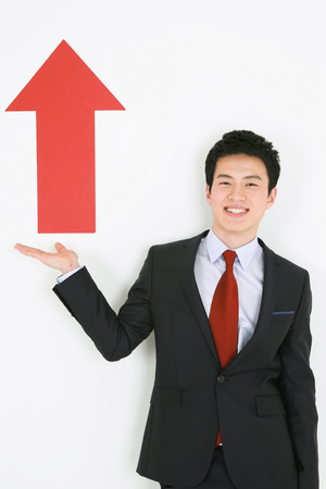 Asian business people in suit - isolated on whiteの写真素材