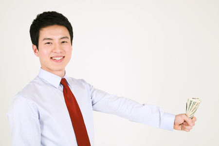 Asian business people in suit - isolated on whiteの写真素材