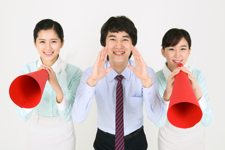 Asian flight attendants - isolated on whiteの写真素材
