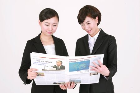 Asian business people - isolated on whiteの写真素材