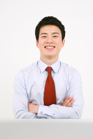 Asian business people - isolated on whiteの写真素材
