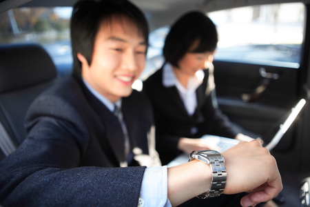 Young Asian business people outside the officeの写真素材