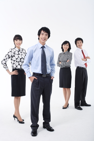 Young Asian business people - isolated on whiteの写真素材