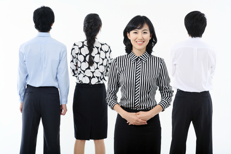 Young Asian business people - isolated on whiteの写真素材