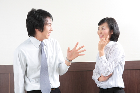 Young Asian business people at workの写真素材