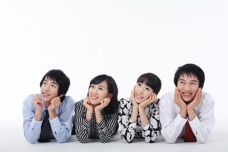 Young Asian business people - isolated on whiteの写真素材