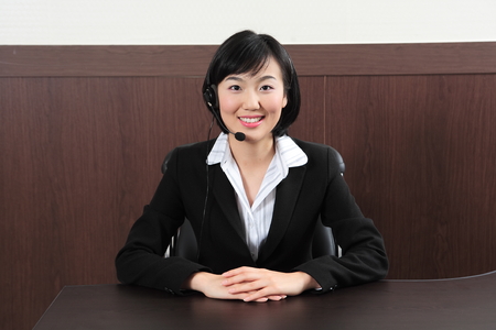 Young Asian business people at workの写真素材
