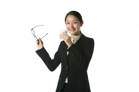 Young Asian business woman - isolated on whiteの写真素材