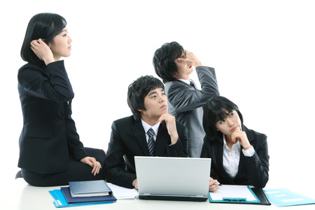 Young Asian business people - isolated on whiteの写真素材