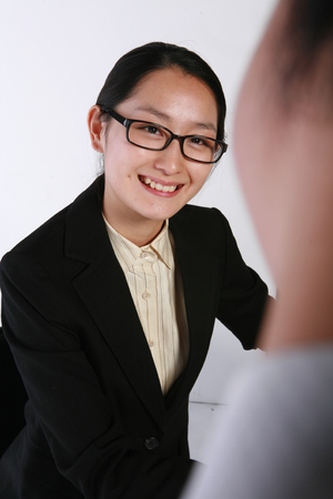 Young Asian business people - isolated on whiteの写真素材