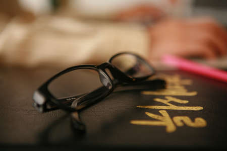 Close up view of hands and documents folderの写真素材