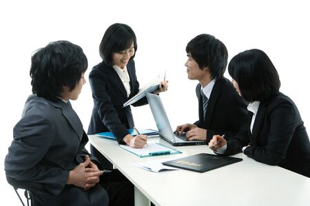 Young Asian business people - isolated on whiteの写真素材