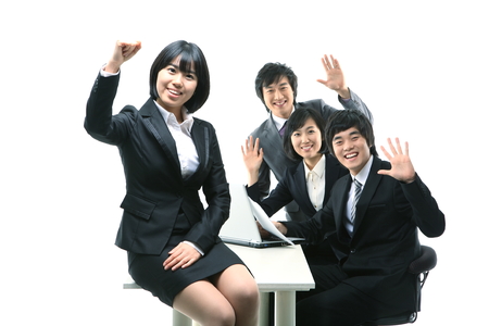 Young Asian business people - isolated on whiteの写真素材