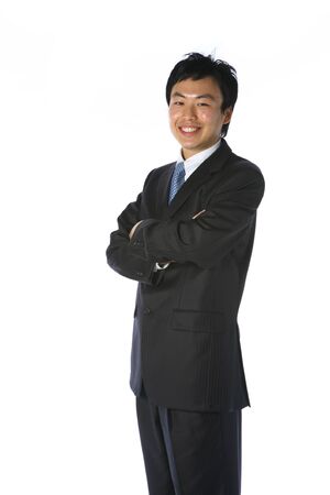 Young Asian businessman posing, gesturing in the studio - isolated on whiteの写真素材