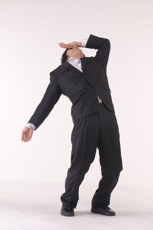 Asian businessman posing in the studio - isolated on whiteの写真素材