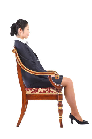 Asian business woman posing in the studio - isolated on whiteの写真素材